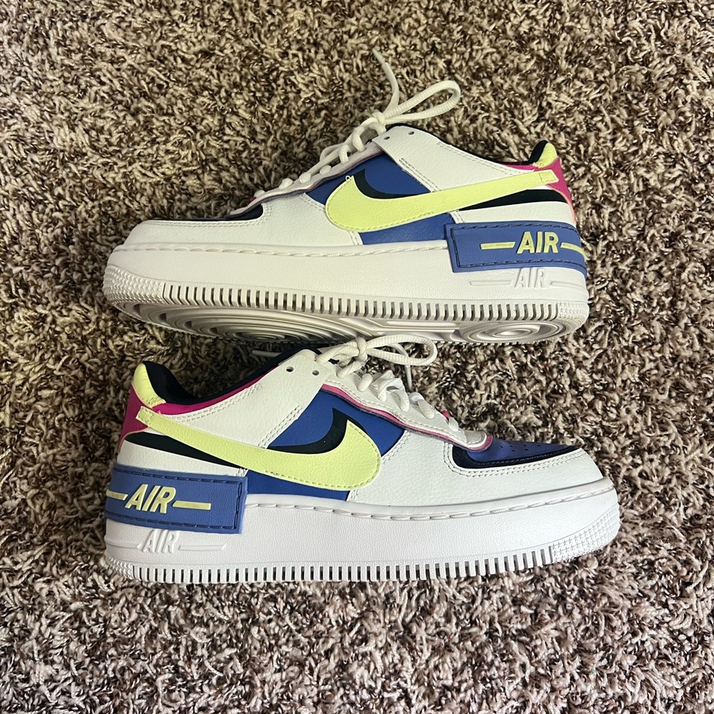 purple, and neon yellow nike air force 1s